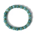 Detailansicht des blauen Chalcedon Perlenarmbands mit funkelnden Strass-Abstandshaltern. - Blau