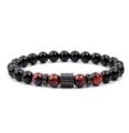 Close-up detail of beaded bracelet with red tiger eye and black micro-inlaid zircon charm. - Reddish Brown Tiger's Eye (22)