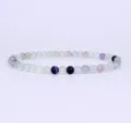 Multi-color gemstone beaded bracelet detail shot, elegant and minimalist jewelry accessory. - Multi-color Gradient