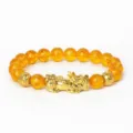 Bracelet porte-bonheur Pi Xiu doré avec perles couleur ambre pour la richesse et chance. - Ambre 12