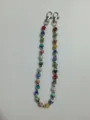 Detailed shot of colorful rhinestone clay disco ball chain with metal lobster clasps for accessories. - 10mm 5-Row Rhinestone Disco Balls / Color 19