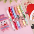 Set di simpatiche penne gel natalizie, penne a sfera cartonate per studenti e regali. - Penne di Natale modello D
