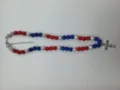 Detailed view of red white and blue Shamballa beads with a sparkling rhinestone cross pendant. - Red White Blue with Cross