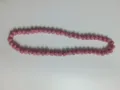 Detailed view of a pink Shamballa necklace featuring glittering rhinestone clay beads - Pink