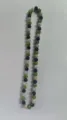 Detailed view of 10mm green black and white rhinestone disco ball beads necklace - Bright Green Black AB White