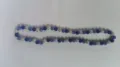 Detail view of 10mm sparkling clay disco ball rhinestone beads on a Shamballa necklace - Blue Dark Blue AB White