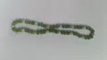 Detailed view of 10mm green and white Shambhala pave crystal disco ball beads set. - Grass Green AB White