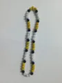 Detail shot of 10mm Shamballa rhinestone clay beads on a yellow and black elastic necklace. - Yellow Black AB White