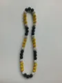 Detail shot of a sparkling Shamballa necklace with black, yellow and white disco beads. - 192 / Approx. 44 Beads, Approx. 51cm (20 Inches)