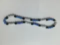 Detailed view of 10mm blue, white, and black rhinestone clay beads shamballa necklace set - Blue White Black