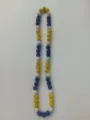 Close-up of 10mm blue, yellow and white Shamballa bead necklace on white background - 102 / Approx. 44 Beads, Approx. 51cm (20 Inches)