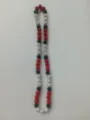 Detail view of 10mm red, white, and blue rhinestone clay beads on elastic necklace. - 90 / Approx. 44 Beads, Approx. 51cm (20 Inches)