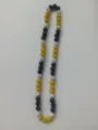 Detailed view of a 10mm rhinestone Shamballa bead necklace in black yellow and white - 67 / Approx. 44 Beads, Approx. 51cm (20 Inches)