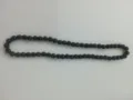 Detailed view of 10mm black textured clay bead necklace for hip-hop style fashion - Solid Black