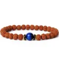 Detailed close-up shot of 7mm rudraksha and blue stone beaded bracelet design. - Style 9