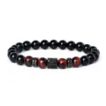 Close-up detail of beaded bracelet featuring tiger eye, obsidian and paved zirconia spacers. - Style 19
