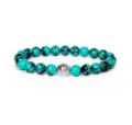 Turquoise stone beaded bracelet with ornate silver spacer bead, ideal yoga jewelry piece. - Turquoise