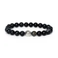 Detailed view of the 8mm black agate beaded bracelet featuring a silver alloy spacer bead. - Black Agate Color