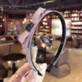 Diadema elegante a cuadros con un lazo de diamantes brillantes y dientes antideslizantes para mujer. - Rosa