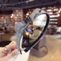 Diadema elegante de pata de gallo con lazo de diamantes brillantes y dientes antideslizantes - Negro