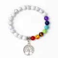 Detail view of white howlite and chakra bead bracelet with silver tree of life pendant. - 19