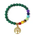 Details of the chakra gemstone bracelet with malachite beads and a gold tree of life pendant. - 26