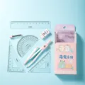 Niedliches 7-teiliges Schüler-Schreibwarenset mit Zirkel, Lineal und niedlichem Cartoon-Design. - Zirkel Set / Rosa