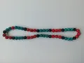 Detailed shot of 10mm Shamballa necklace with red, black, and teal disco ball beads. - Bracelet / Red Black Lake Blue (97)