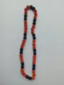 Close-up of 10mm orange and black rhinestone Shamballa bead necklace for sports fans - 117 / Approx. 44 Beads, Approx. 51cm (20 Inches)