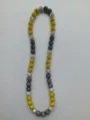 Detailed view of 10mm Shamballa clay beads with yellow, silver, and black rhinestones - 121 / Approx. 44 Beads, Approx. 51cm (20 Inches)