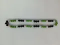 Detail view of 10mm green, black and white rhinestone Shamballa beads on a necklace - Green Black White Patchwork