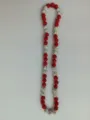 Macro view of 10mm red and white crystal Shamballa beads on an elastic necklace string. - 133 / Approx. 44 Beads, Approx. 51cm (20 Inches)