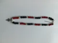 Detailed view of the red black and silver rhinestone shamballa bead necklace with a cross pendant. - Color Matched Bracelet (Approx 19cm, ~20 Beads, Elastic Line, No Clasp) / Red, Black and Silver (57)