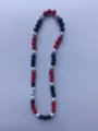 Detailed view of red, black and white pave rhinestone disco ball beads on a Shamballa necklace - 190 / Approx. 44 Beads, Approx. 51cm (20 Inches)