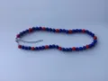 Detail view of the red and blue rhinestone shamballa beaded necklace with lobster clasp. - Red and Blue Rhinestone Ball Style (22) / Necklace approx 16 inches (approx 40cm) / Red/Blue