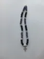 Detailed view of the sparkling Shamballa rhinestone bead necklace with a cross pendant. - Black Purple Silver Multicolor Rhinestone Ball with Cross Pendant Style (66) / Necklace approx 16 inches (approx 40cm) / Black, Purple and Silver