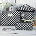Set of three black and white checkered quilted makeup bags in various sizes - L / Black & White Checkerboard