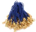 Close-up detail of blue nylon lanyard cords with gold lobster clasps for DIY crafts. - Blue