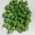 Grüne Strass-Herz Tonperlen Detailansicht glitzernde Oberfläche für DIY Schmuck basteln. - 12*15mm / Obstgrün