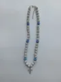 Detail view of sparkling Shamballa bead necklace featuring a micro paved iced out cross pendant - Cross Pendant Style / Color Matched Bracelet (Approx 19cm, ~20 Beads, Elastic Line, No Clasp) / Dark Blue and Silver