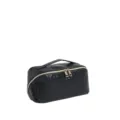 Dettaglio di una grande borsa da toilette in pelle nera intrecciata per il viaggio - Nero