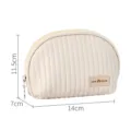 Elegant cream quilted PU leather shell makeup bag with dimensions 14cm x 11.5cm x 7cm - Beige