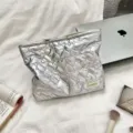 Metallic silver quilted PU heart pattern cosmetic bag for stylish makeup storage. - Heart Silver