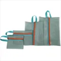 Detailed view of 4-piece multifunctional travel storage mesh bags in various sizes - Set of 4 / Blue