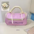 Vue détaillée de la grande trousse de maquillage rose avec largeur 22cm et rangement - 22*9.5*11cm / Violet