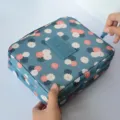 Floral waterproof cosmetic travel bag with large capacity and durable zipper closure - Blue Flower