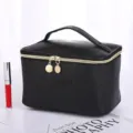 Portable black cross-grain PU leather cosmetic bag with double gold zippers and handle - Handbag Style / Black