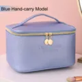 Portable light blue cross-grain PU leather cosmetic bag with top handle and gold zippers - Handbag Style / Blue