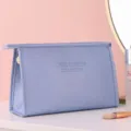 Blue cross-pattern PU leather square cosmetic bag, portable waterproof travel toiletry pouch - Square Style / Blue
