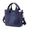Navy blue Japanese style canvas tote bag with adjustable shoulder strap and front pocket - Crossbody Style / Dark Blue / S